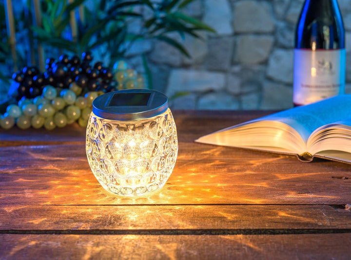 Lunartec Solar Tischlicht: Solar-LED-Windlicht aus Glas, mit tollem Lichtmuster, IP44, Ø 10 cm (Tisc