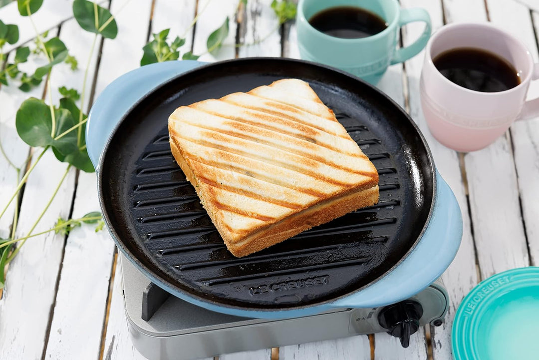 Le Creuset Runde Grillplatte aus Gusseisen mit Hilfsgriff, 25 cm, Schwarz matt, Schwarz Matt