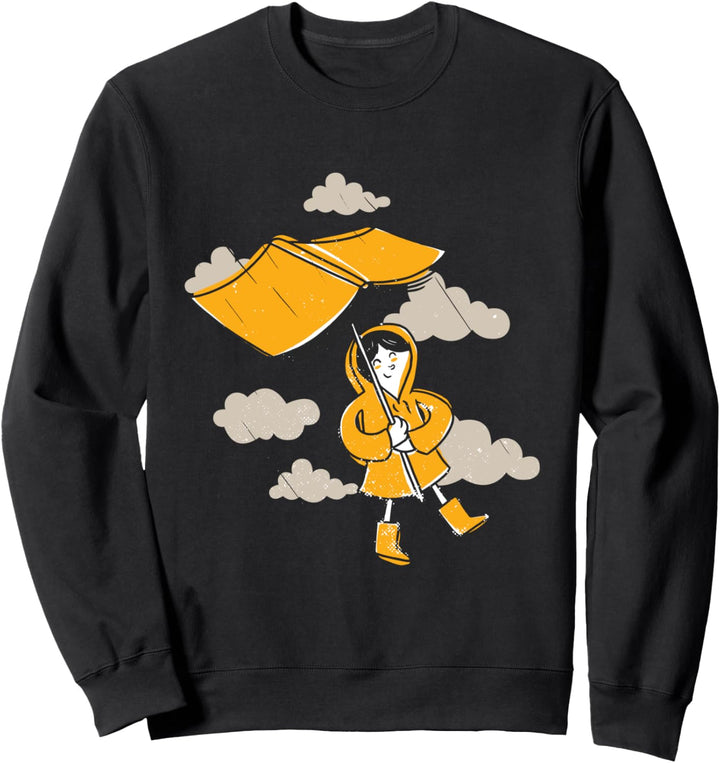 Mädchen hält ein Buch als Regenschirm unter dem Regen Sweatshirt