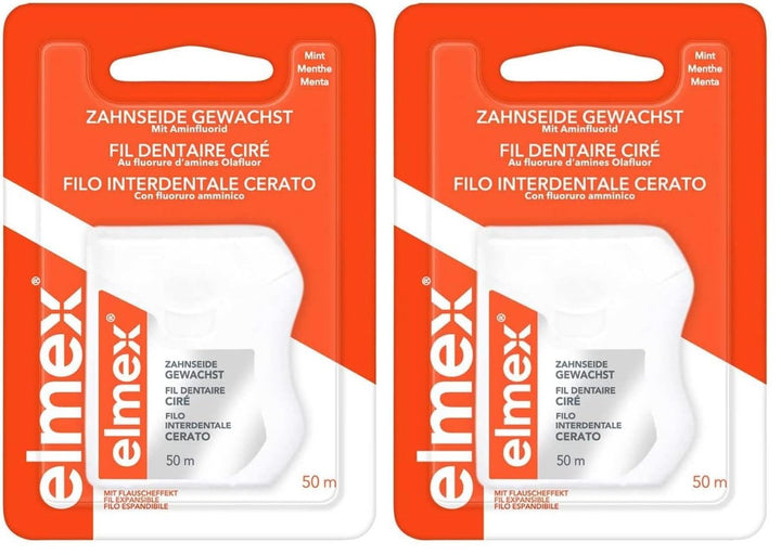 elmex Zahnseide 50 m – gewachstes Zahnband für eine gründliche Zahnreinigung – Faden mit Flauscheffe